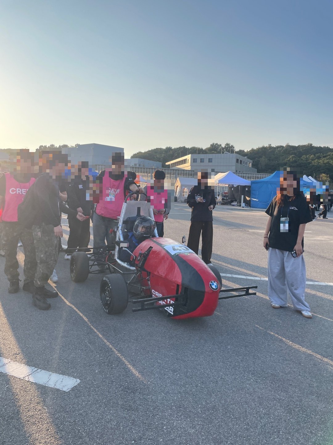 Student-built EV race car in the paddock on day one of the competition
